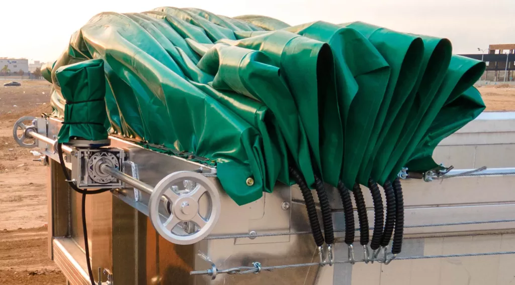 Automated electrical tarps and tensile shade structures.